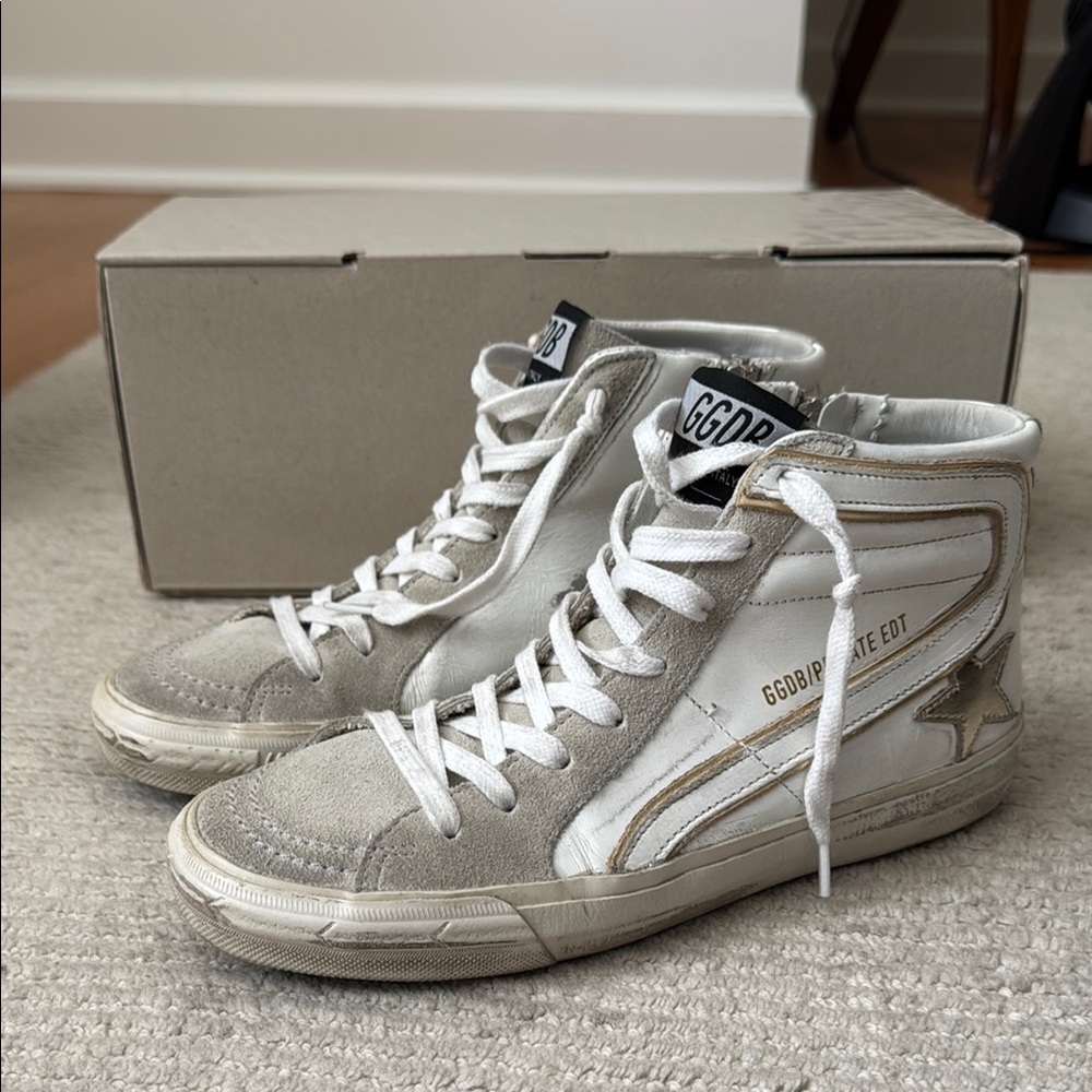 Golden Goose Slide High Top Sneaker. White and Gold with Star Detail.